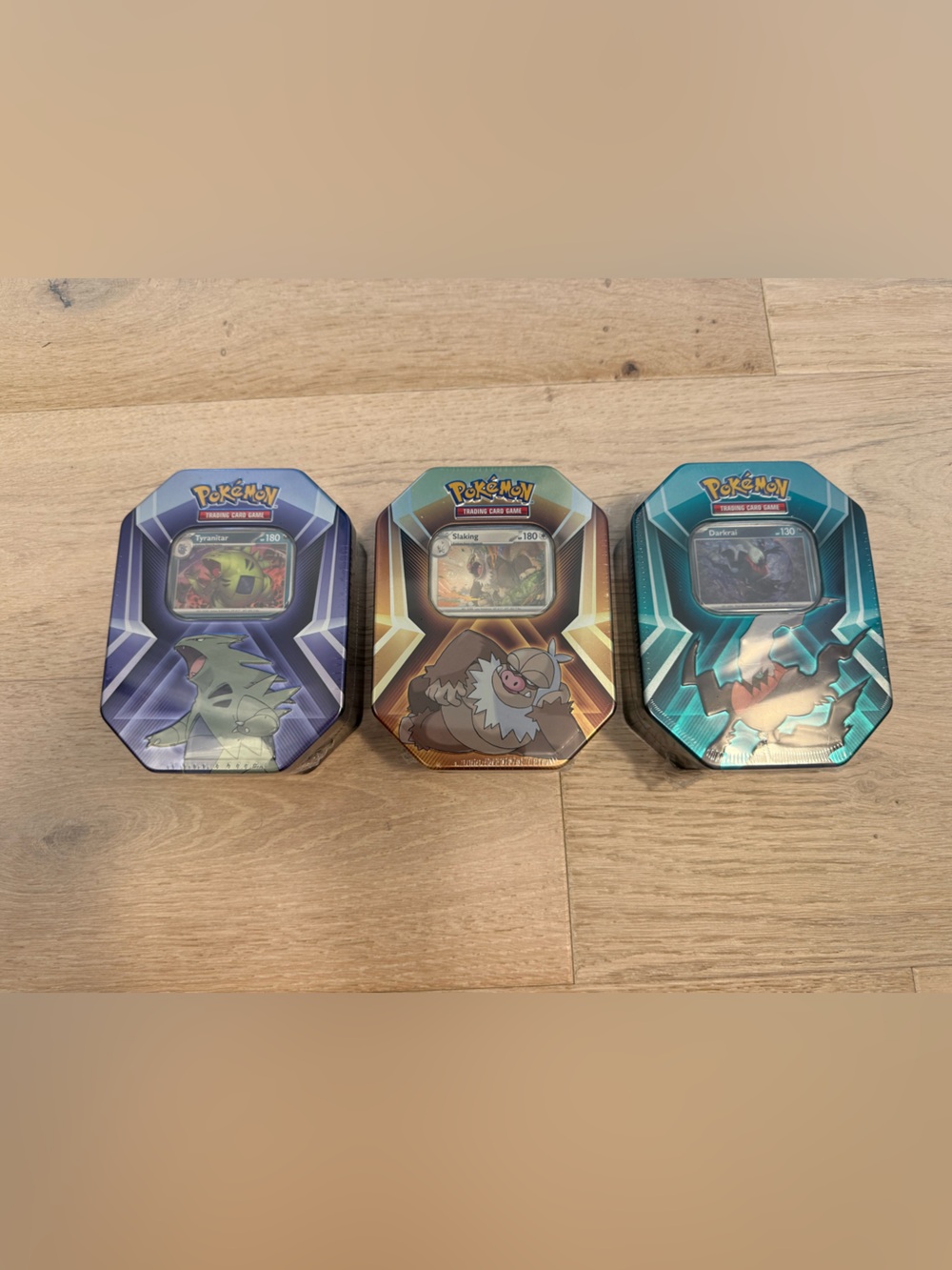 Pokemon 3 Tin Set. Tyranitar, Slaking, and Darkra NEW in Tin